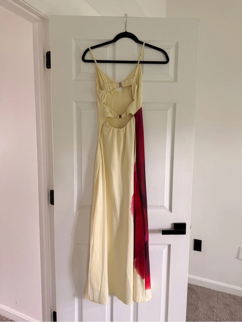 Yellow satin gown with floral accent